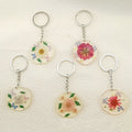 Silver Tone Round Pressed Flower Resin Clip Keychains in Five Designs view 3