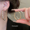 Textured Metal Hoop Earrings in Three Twisted Designs view 2