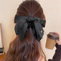 Black Satin Oversized Bow Hair Claw Clip with Gold Charm view 2