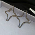 Open Star Outline Earrings in Gold Gunmetal and Silver Tones view 7