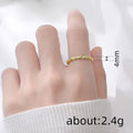 Gold Tone Twisted Rope Band Ring with Clear Accents view 4