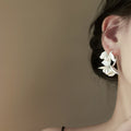 White Petal Flower and Pearl Cluster Stud Earrings view 2