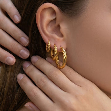 Gold Steel Twisted Hoop Earrings Three Sizes 316L Steel