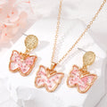 Gold Tone Butterfly Resin Pressed Flower Necklace Earring and Set Options view 3