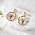 Irregular Gold Frame Dried Flower Resin Earrings Heart Posts view 4