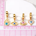 Gold Tone Evil Eye Huggie Drop Earrings in Five Designs view 4