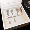 Pink Leaf Pearl Drop Ear Cuffs and Silver Bow Ear Cuffs view 4
