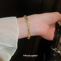Gold Tone Oval Plate And Tiny Crystal Flower Link Bracelet view 4