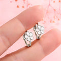 White Enamel Flower Mini Huggie Hoop Earrings Two Tones view 2