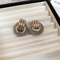 Triple Loop Round Statement Stud Earrings in Gold and Silver Tones view 7