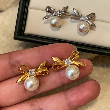 Bow and Pearl Stud Earrings in Gold and Dark Silver