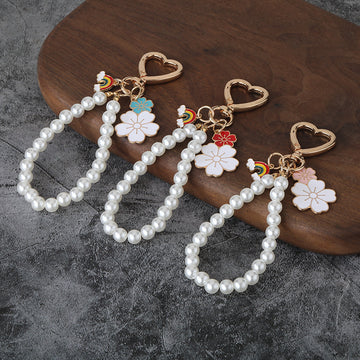 Heart Clasp Keychain With Rainbow Charm And Pearl-Like Bead Loop