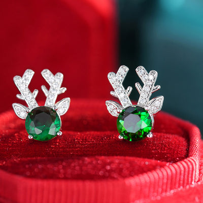 Image 5 showing green crystal reindeer stud earrings