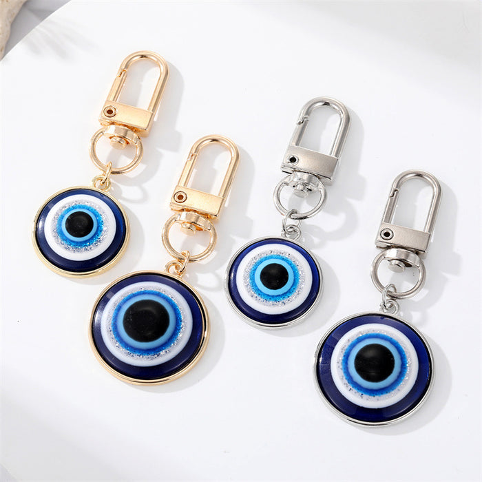 Gold and Silver Tone Round Blue Evil Eye Clip Keychains in Two Sizes