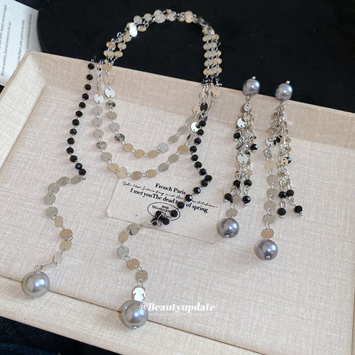 Silver sequin black crystal pearl necklace and tassel earrings in tray