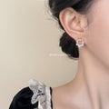 Gold Tone Clear Stone Bow And White Pearl Circle Stud Earrings view 2