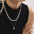 Gold Steel Teardrop Pendant Necklaces and White Shell Pearl Strand view 3