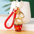 Jeweled Peanut and Auspicious Charm Keychains with Braided Wrist Loops view 4