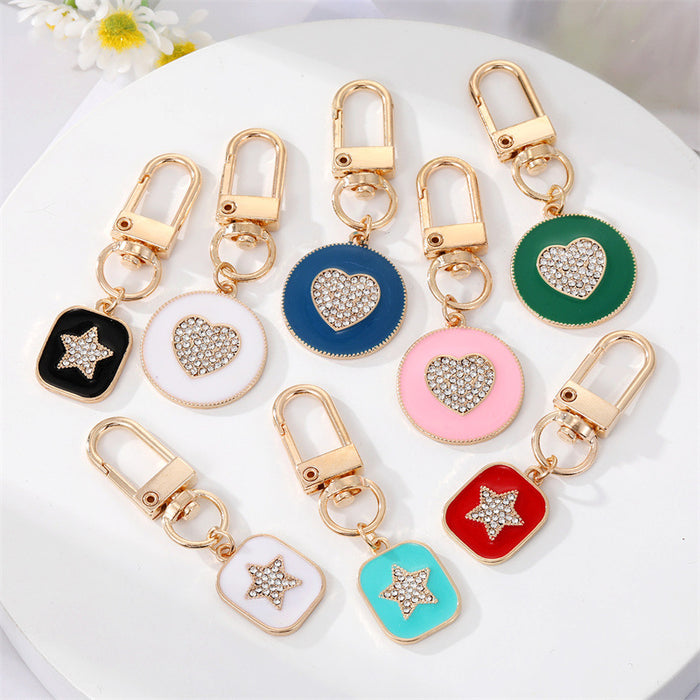 Gold Tone Crystal Heart and Star Medallion Clip Keychains