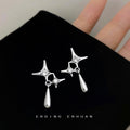 Silver-Tone Star Cross Clear Stone Teardrop Drop Earrings view 1