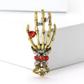 Skeleton Hand Brooch With Jeweled Ring and Ornate Cuff view 2