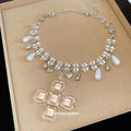 Silver Tone Cross Charm Necklace with Crystal Fringe view 4