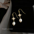 Gold Tone Eight Point Star And White Pearl Hook Earrings view 1