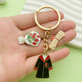 Graduation Charm Keychains Featuring Black Flower Across 32 Pictured Variations view 1