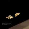 Gold Asymmetric Wing Stud Earrings Clear CZ Accents view 6