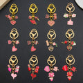 Twelve Pink and Red Love Heart Metal Keychain Designs view 2