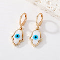 Gold Tone White Shell Round Heart and Hamsa Eye Huggie Earrings view 4