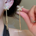 Crystal Butterfly Linear Tassel Clip On Earrings With Polished Metal Details view 3
