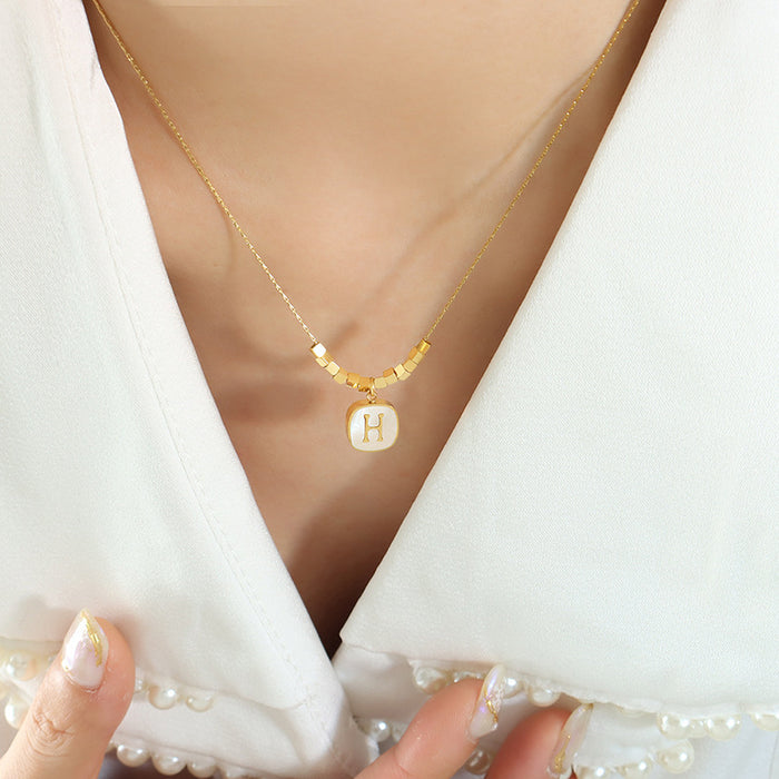 White Shell Smiley and Letter H Pendant Necklace Gold