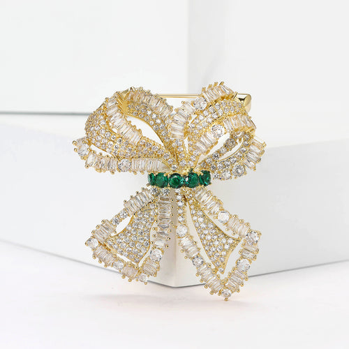 Silver pave bow brooch front close