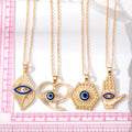 Gold and Silver Tone Geometric Hamsa Evil Eye Pendant Necklaces view 5