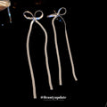 Silver Tone Bow and Long Chain Drop Earrings Decorative Jewelry view 2