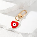 Gold Tone Heart Enamel Evil Eye Clip Keychains in Six Colors view 6