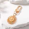 Gold Tone Smiling Sun Keychain Earrings and Pearl Necklace view 6