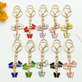 Butterfly Charm Keychains Featuring Blue Butterfly Across 35 Pictured Variations view 1