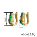 Gold Tone Green Channel Set Huggie Hoop Earrings With Clear Accents view 4
