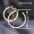 White Enamel Bamboo Large Hoop Earrings Gold Accent Posts view 4