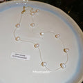 Gold Tone Floating Pearl Station Necklace with Polished Metal Tone Details view 2