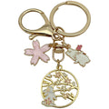 Cat Charm Keychains Featuring White Flower Across 19 Pictured Variations view 7