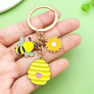 Bee and Honeycomb Charm Keychains Featuring Flower Across 33 Pictured Variations