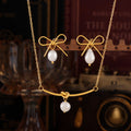 Gold Bow Pearl Stud Earrings And Knot Bar Pearl Necklace view 2