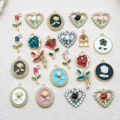 Colorful heart charms arranged on a light background
