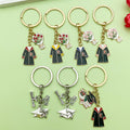 Graduation Charm Keychains Featuring Graduation Across 31 Pictured Variations view 2