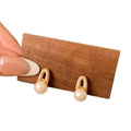 Gold Tone Pearl Drop Earrings with Textured Oval Frames view 5
