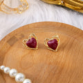 Gold Twist Frame Heart Stud Earrings Marbled Enamel Centers view 2
