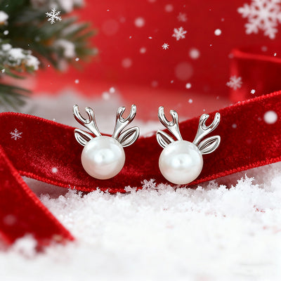 Image 1 showing pearl reindeer stud earrings